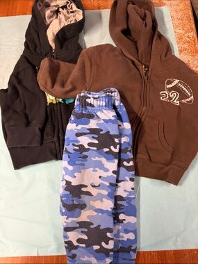 12 mth boys. 2 zip up sweatshirts and 1 pants